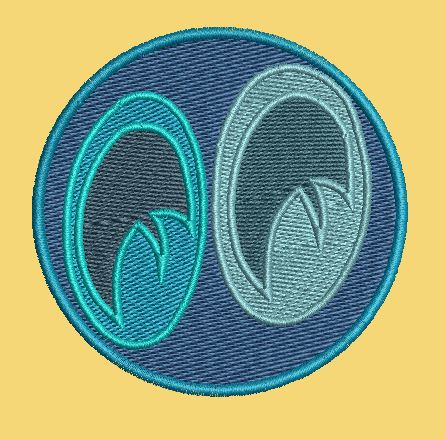Dual Eye Motif Embroidery Design